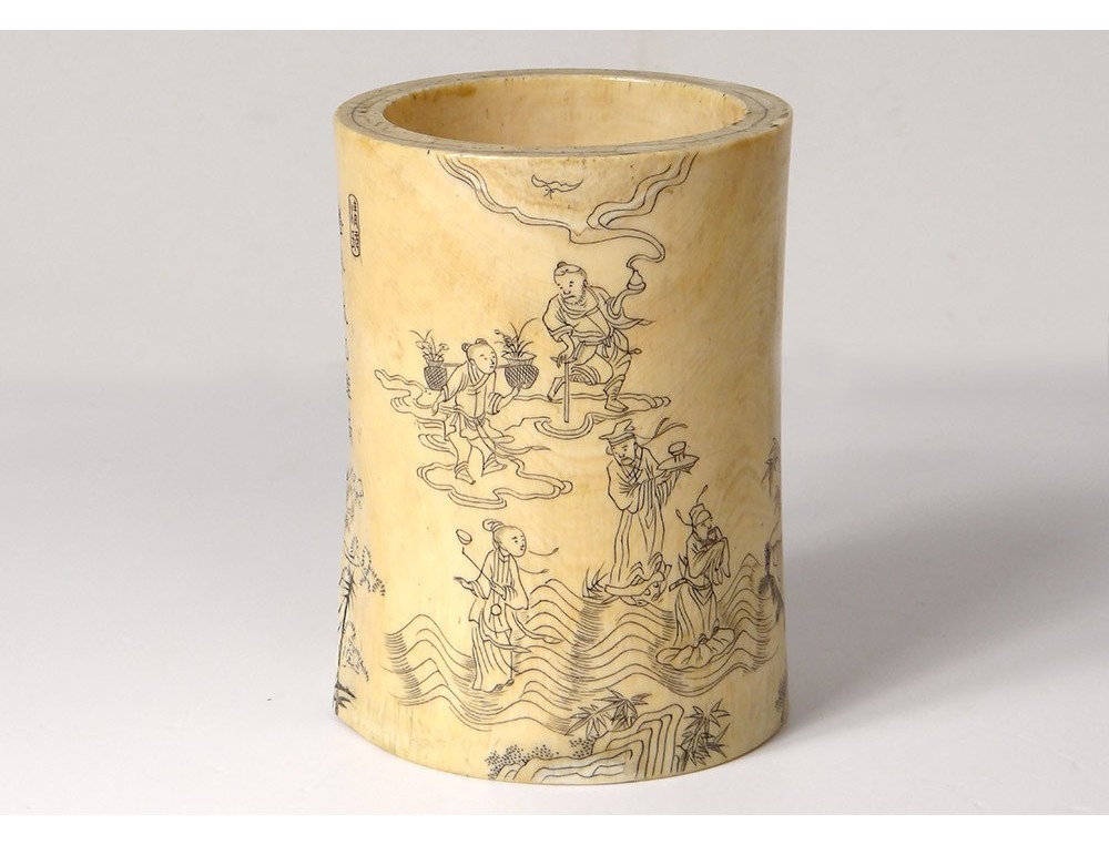 A carved and moulded yellow-glazed brushpot, bitong, 19th century