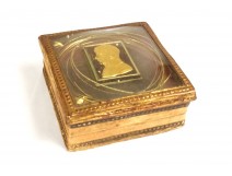 Small cardboard box with golden paper profile of Napoleon First Consul early 19th century