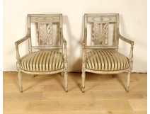 Pair of Directoire armchairs lacquered wood palmette shell seats late 18th century