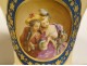 Pair of Paris porcelain flowerpots, children, cat, dog, Napoleon III, 19th century