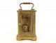 Gilt bronze travel clock in 19th century leather box