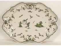 Moustiers earthenware dish with grotesque monkeys, dog, insects and foliage, 19th century