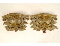 Pair of small wall consoles in carved shell wood, 19th century