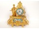 Gilded clock with Sèvres porcelain plaques, elegant woman, 19th century library