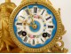 Gilded clock with Sèvres porcelain plaques, elegant woman, 19th century library