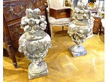 Pair of large decorative fire pots in white stone, flowers and fruits, late 18th century