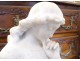 Large white marble sculpture of a pensive woman holding a torch Art Nouveau late 19th century