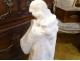 Large white marble sculpture of a pensive woman holding a torch Art Nouveau late 19th century