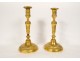 Pair of Louis XVI candlesticks, gilded bronze torches, monogram DD, 19th century