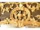 Large Regency mirror in carved gilded wood with shell flowers, 18th century