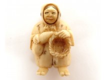 Netsuke Katabori character swivel head basket carved ivory Japan 19th century