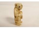 Netsuke Katabori character swivel head basket carved ivory Japan 19th century