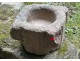 Old granite holy water stoup with ears, Brittany, 13th century