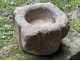 Old granite holy water stoup with ears, Brittany, 13th century