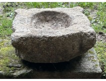 Old granite holy water stoup with ears, Brittany, 13th century