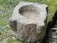 Old granite holy water stoup with ears, Brittany, 13th century