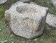 Old granite holy water stoup with ears, Brittany, 13th century