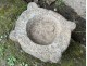 Old granite holy water stoup with ears, Brittany, 13th century