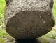 Old granite holy water stoup with ears, Brittany, 13th century