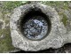 Old granite holy water stoup with ears, Brittany, 13th century