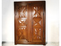 Louis XIII cabinet door, carved walnut and decorated with diamond points, seventeenth