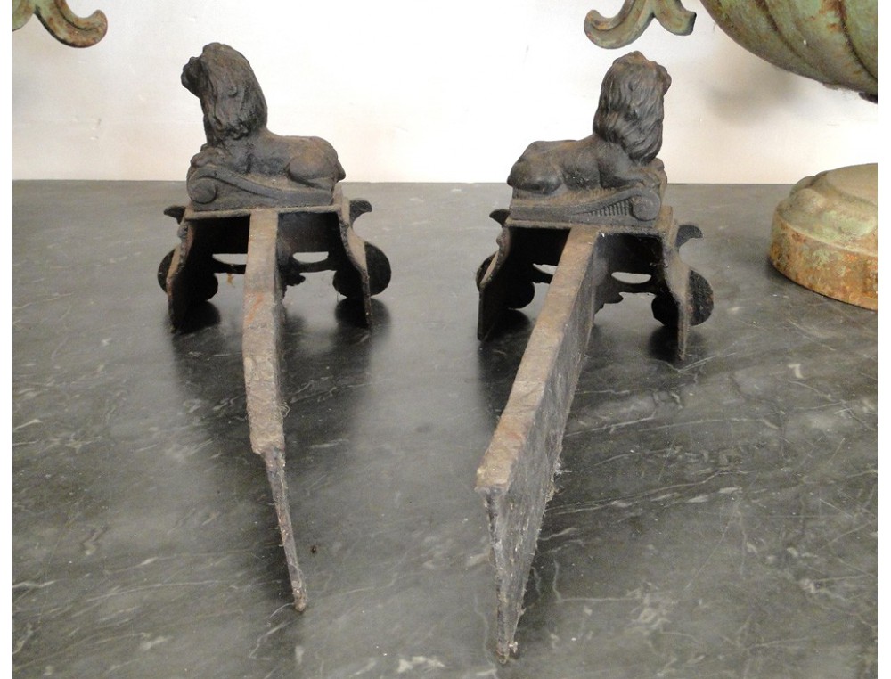 Pair Of Cast Iron Andirons In The Shape Of Lions And Decorated With 