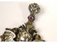 Pendant, sterling silver jewelry, rubies and garnets, decorated with the head of a cherub, nineteenth