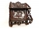 Wall shelf carved in the Black Forest, decorated with a stag and oak leaves, nineteenth