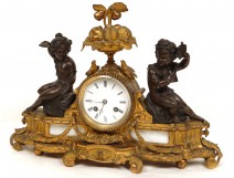 Clock gilded bronze cherubs love tambourine music Napoleon III nineteenth