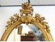 Oval mirror wood frame stucco golden flower ice bizautée Louis-Philippe nineteenth