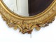 Oval mirror wood frame stucco golden flower ice bizautée Louis-Philippe nineteenth