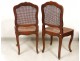 Louis XV carved walnut chairs pair caned acanthus flowers nineteenth century