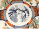 Large flat Imari porcelain Japan fish birds herons garden flowers XIX