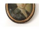 Miniature painted young man medallion golden metal frame eighteenth century